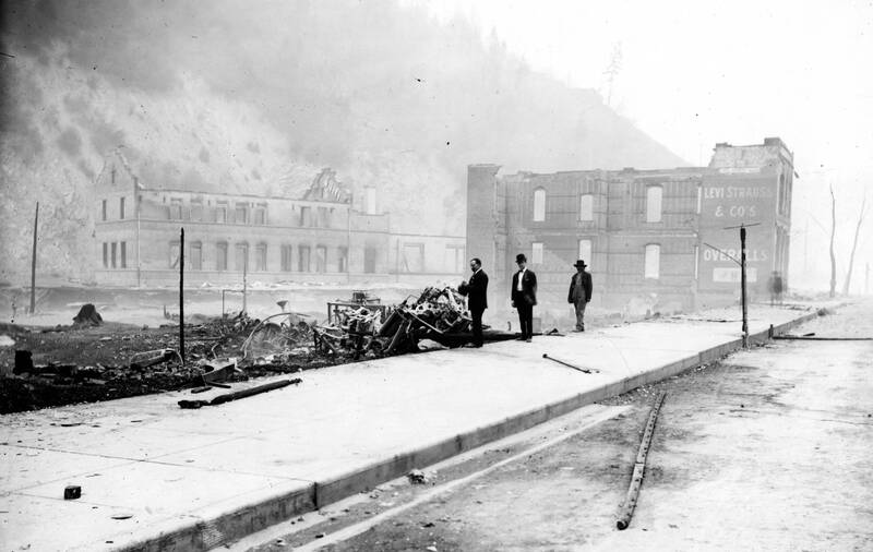 item thumbnail for Forest Fire 1910 - Wallace, Idaho Remains of brick building at 721 Bank and, in background, O.R. & N depot, after fire of August 20.

