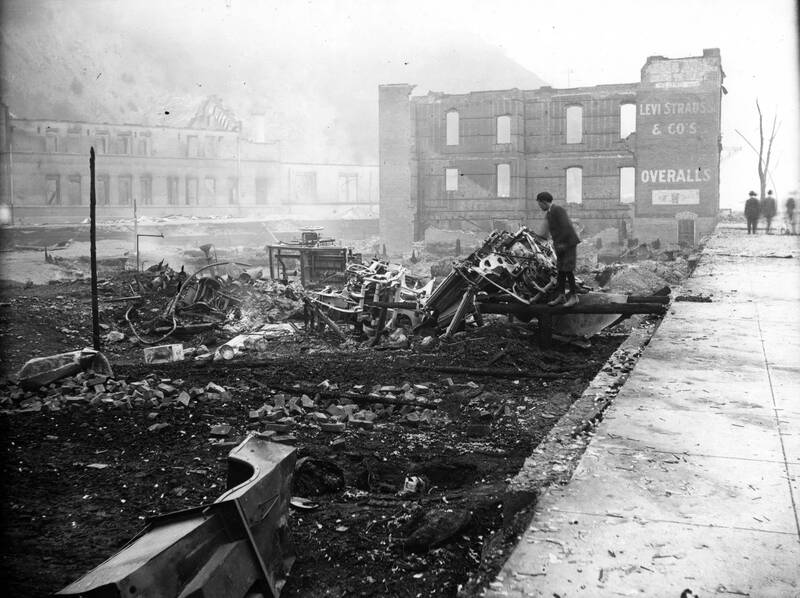 item thumbnail for Forest Fire 1910 - Wallace, Idaho Remains of brick building at 721 Bank and, in background, O.R. & N depot, after fire of August 20.