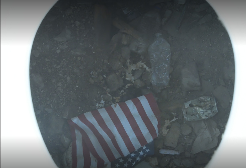 American flag found in outhouse near Basin Butte lookout. 