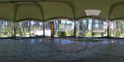 Panoramic photo of the interior of the Cold Mountin Lookout cabin. 