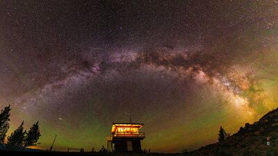 Photo by Mark Moak of Spot Mountain Lookout under the Milky Way