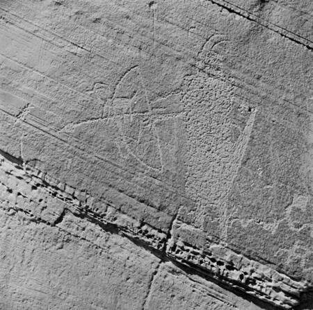 Petroglyph of hunter with bow and arrow