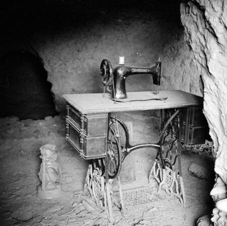 Lantern and sewing machine in California Bar caves