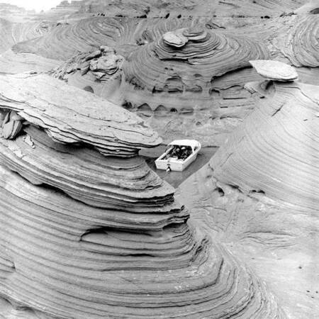 Boat among swirled rock