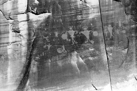 Petroglyphs on varnished wall