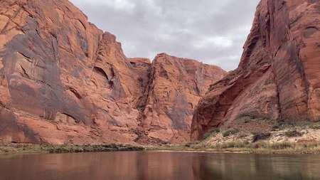 Boating up a slow-moving Colorado River from Lee's Ferry