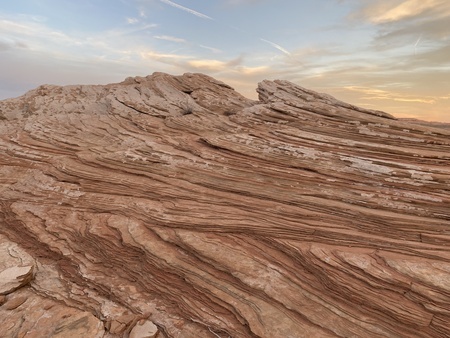 Laminated rock formations, mineral deposits peeling away