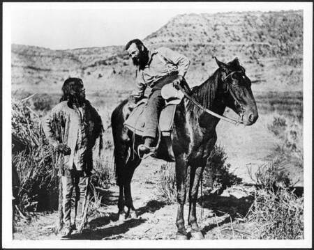 Powell talking to a Paiute man during one of his surveys