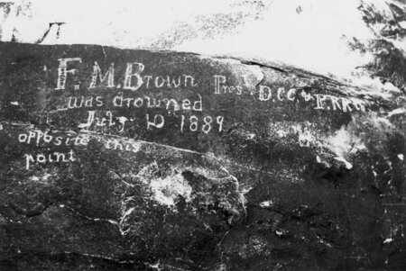 Franklin Brown's inscripted memorial after his death in Soap Creek rapid