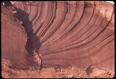 Curved ridges on cliff wall
