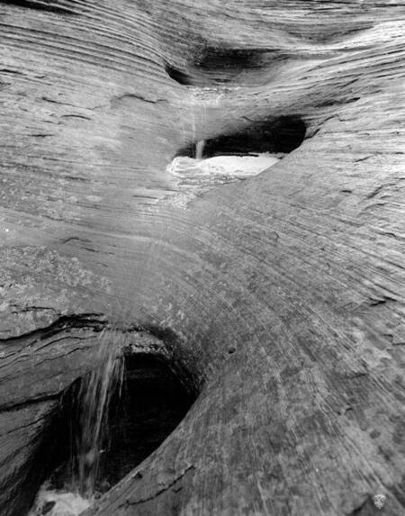 Water running through potholes